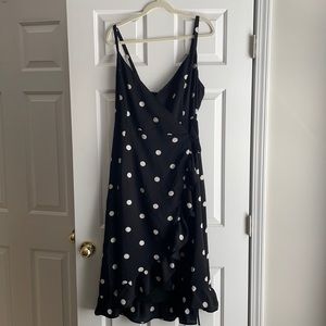 Polka dot wrap dress with ruffle hem detail